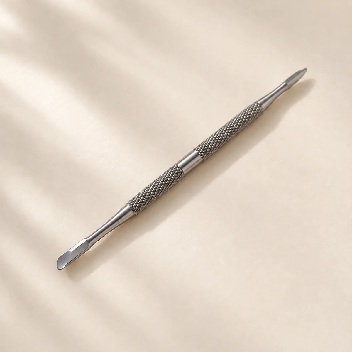Repousse-cuticules double embout Geloria en acier